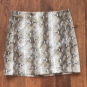 Wild honey faux leather snakeskin skirt.